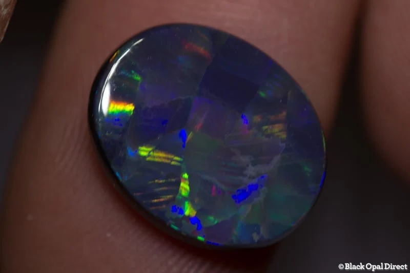5.67 ct harlequin black opal 16x13x4mm - Image 3