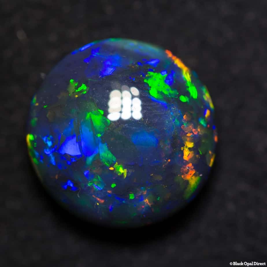 5.83 ct gem round black opal 12x12x6.5mm