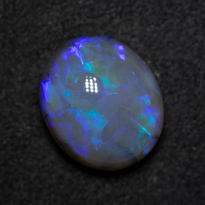 5.84 ct black opal 12.7x10.8x7.5mm