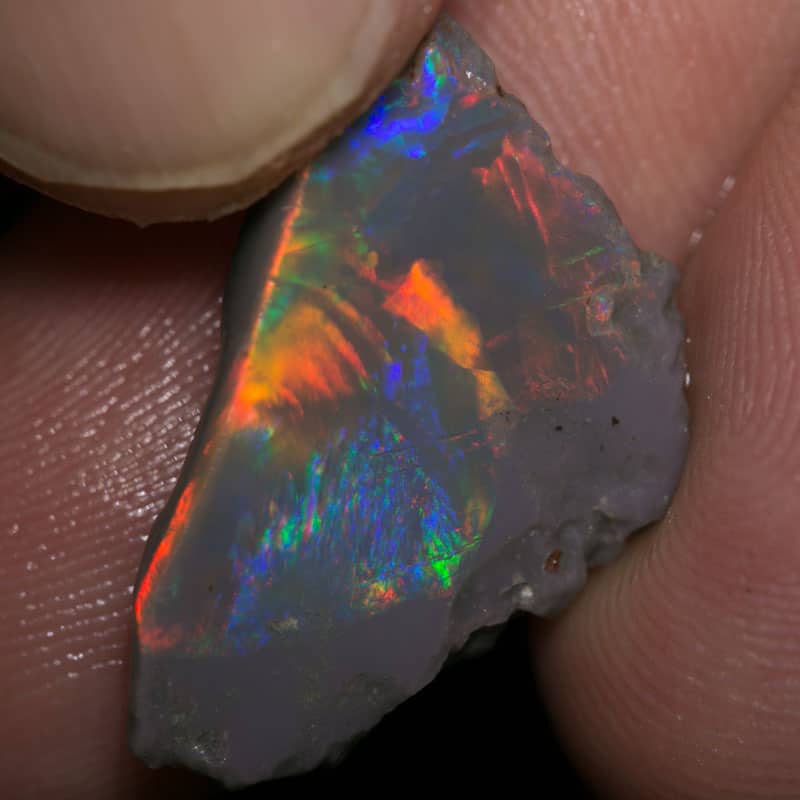 7.95 ct roughly rubbed opal piece 24mm across