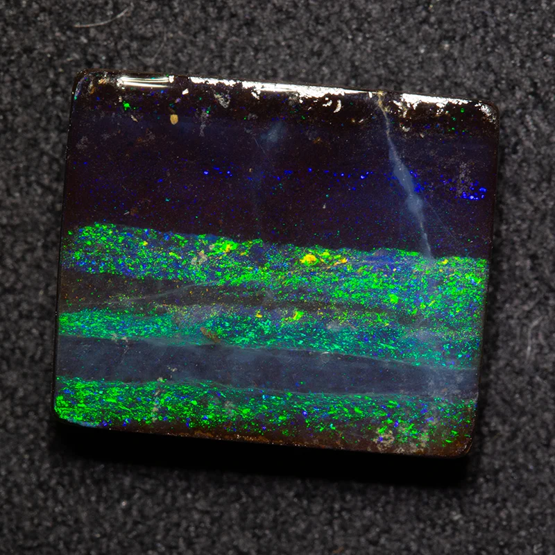 8.09 ct boulder opal 13.5x11.3x4.2mm