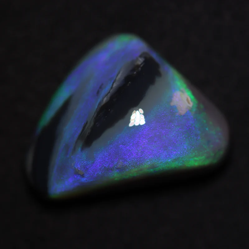 9.17 ct dark opal 17.3x12.9x7.6mm