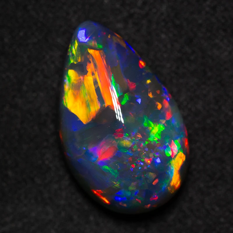 9.44 ct gem black opal 18.6x11.5x7.8mm