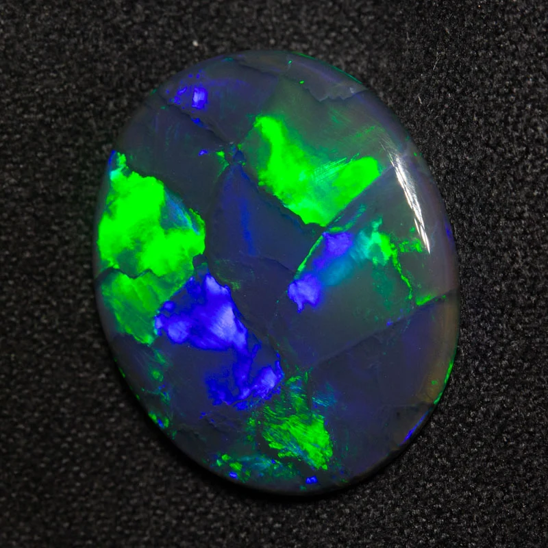 9.87 ct gem black opal 20.6x17.1x4.3mm